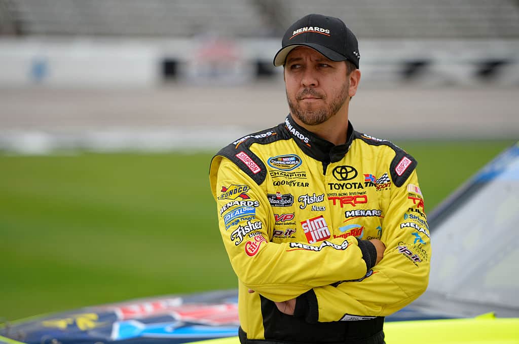 FORT WORTH, TX - NOVEMBER 04:  Matt Crafton, driver of the #88 DampRid/Menards Toyota, stands on the grid during Salute to Veterans Qualifying Fueled by Texas Lottery for the NASCAR Camping World Truck Series Striping Technology 350 at Texas Motor Speedway on November 4, 2016 in Fort Worth, Texas.  (Photo by Robert Laberge/Getty Images)